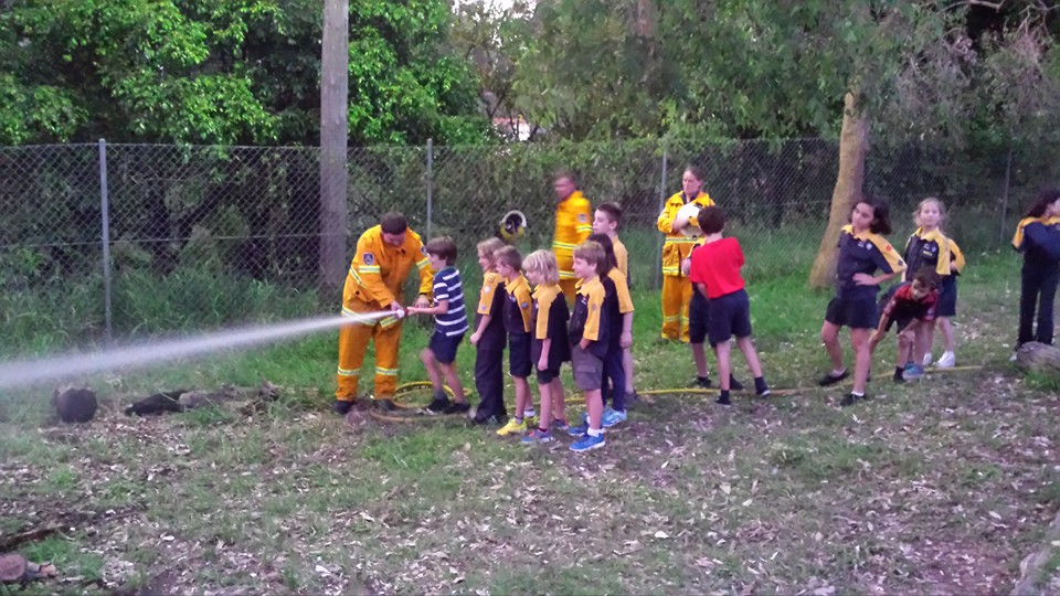 Pearl Beach RFS Extinguishing Fire in fire pit